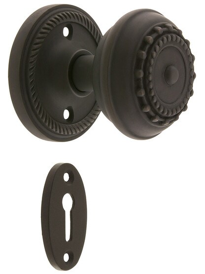 Rope Rosette Style Mortise Lock Set With Meadows Door Knobs in Oil-Rubbed Bronze finish.